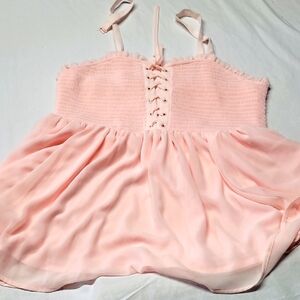 Torrid Pink Babydoll top with Spaghetti Straps and Sleeveless Design
